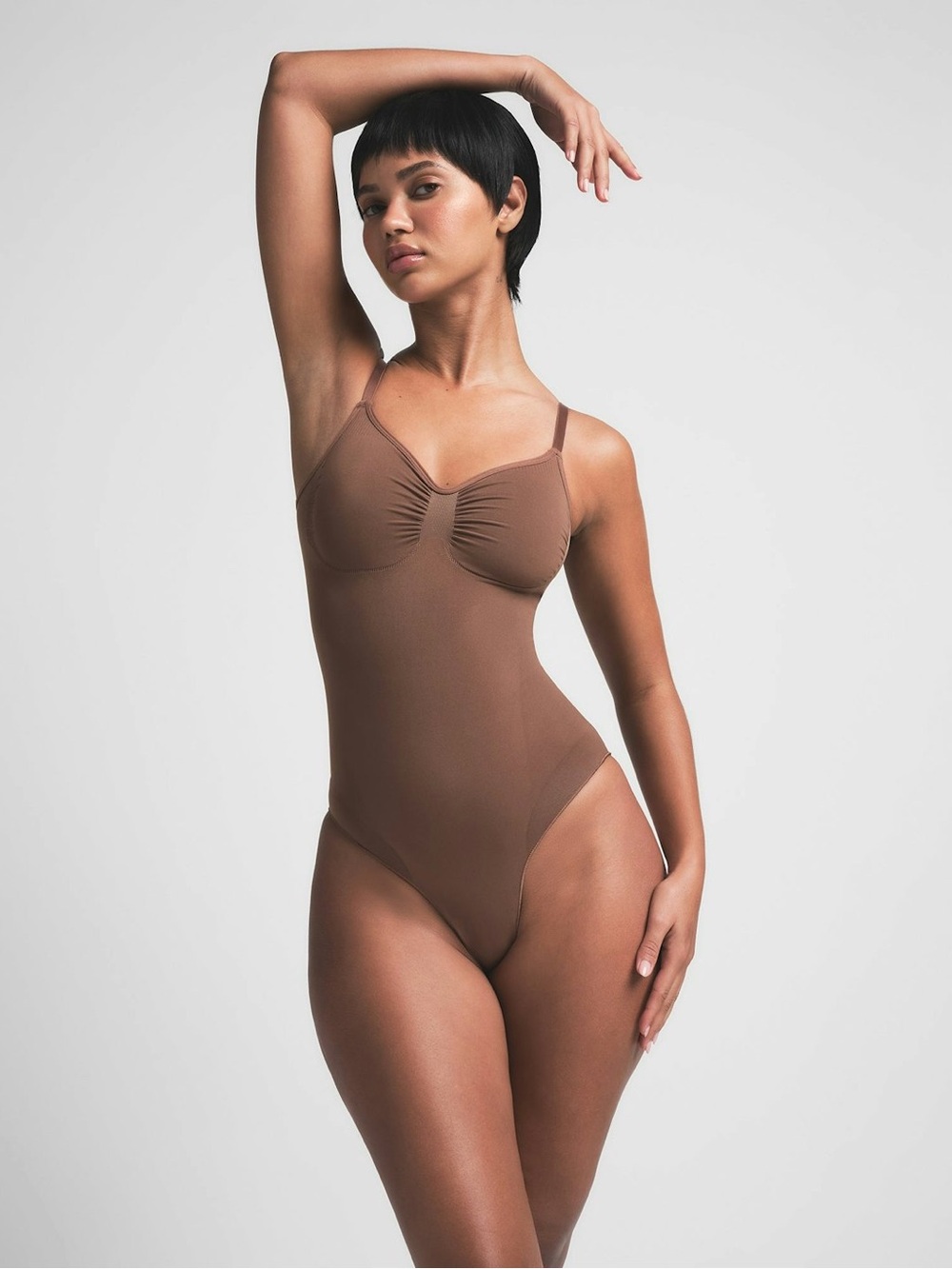 SKIMS Kids One-Piece Bodysuit in Brown